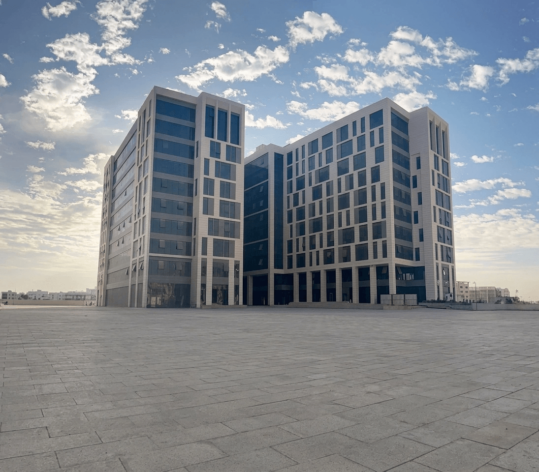 The two wings of LINX Tower and the recessed central entrance facing the courtyard